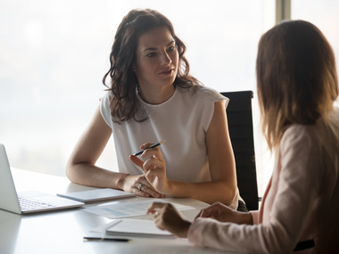 Two people in office