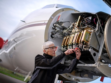 Female aircraft mechanic