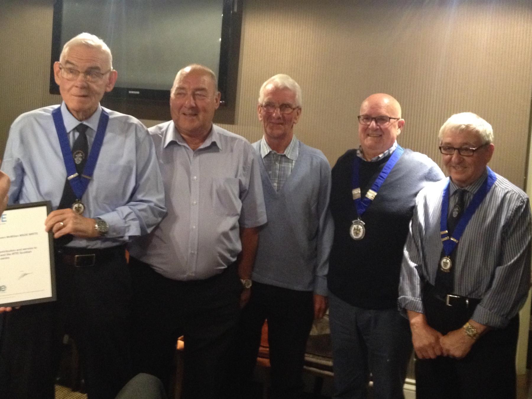 Robert being awarded an SOE Dedicated Service Award