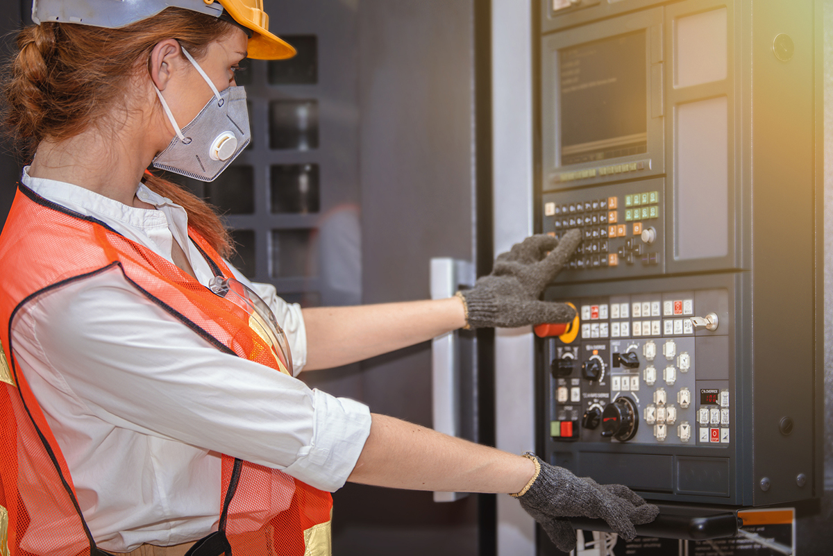 Engineer looking at control panel